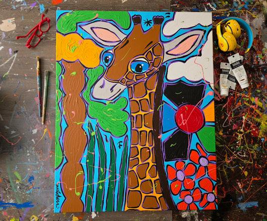 Colorful painting of a giraffe on a textured surface with art supplies.