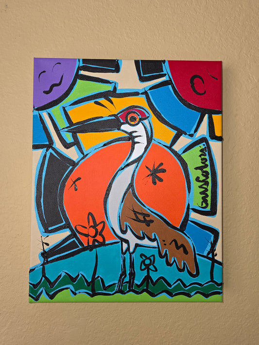 Colorful abstract painting of a bird on a beige wall