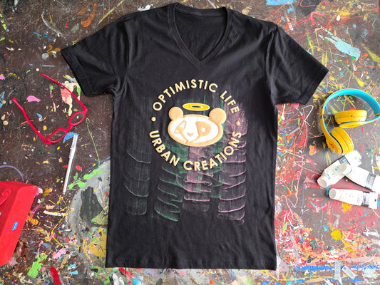 Black t-shirt with a graphic design on a colorful, textured surface